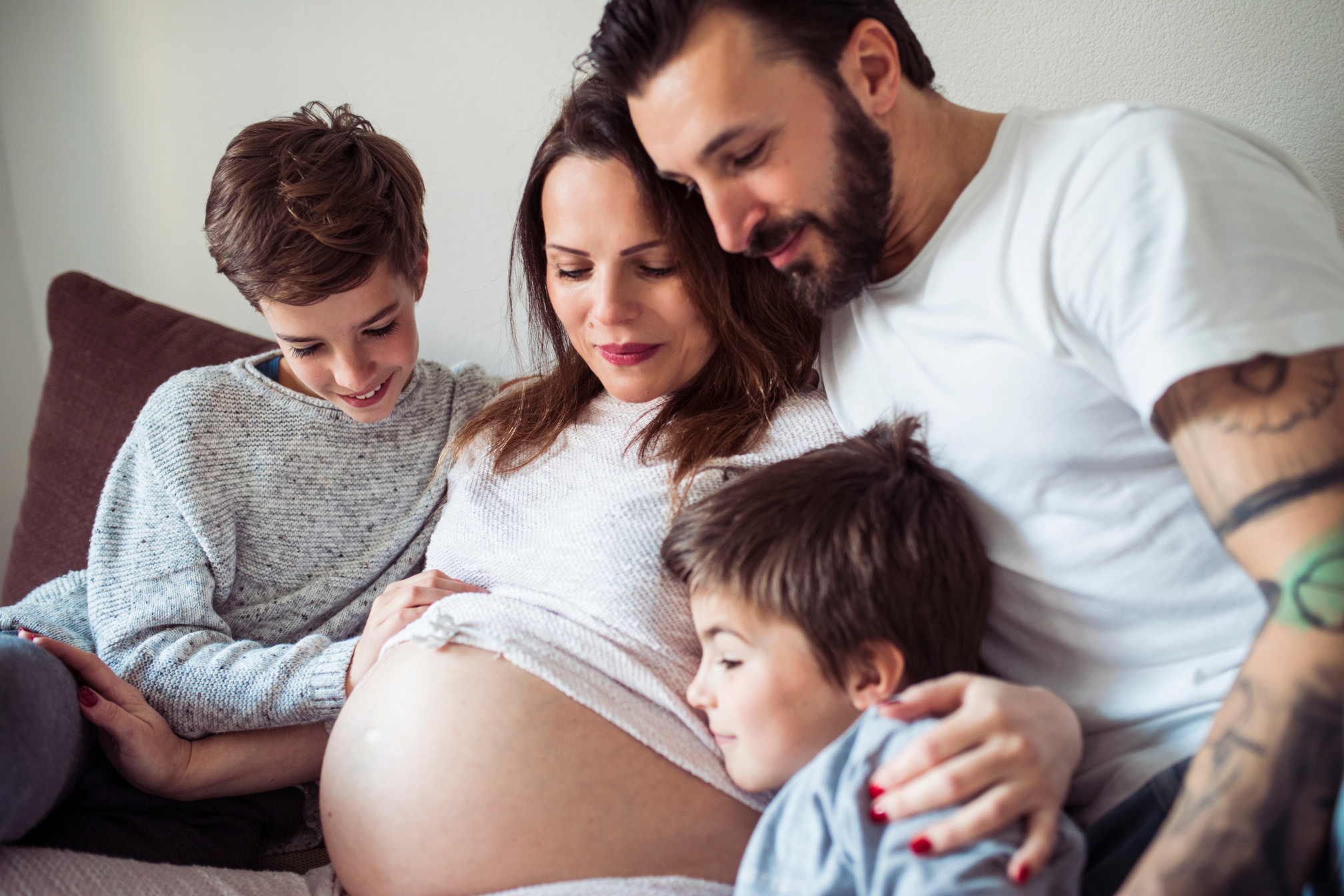 Pregnant woman with her family